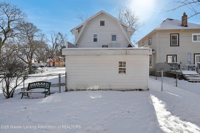 view of snow covered property