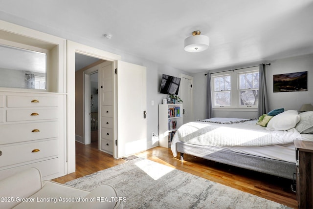 bedroom with light hardwood / wood-style flooring