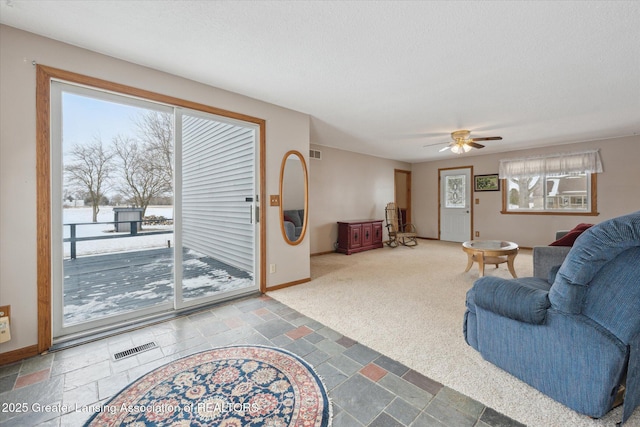 living room with ceiling fan