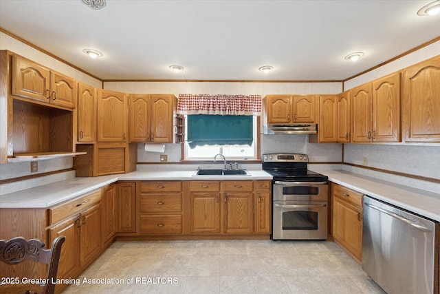 kitchen featuring sink, crown molding, stainless steel appliances, and decorative backsplash