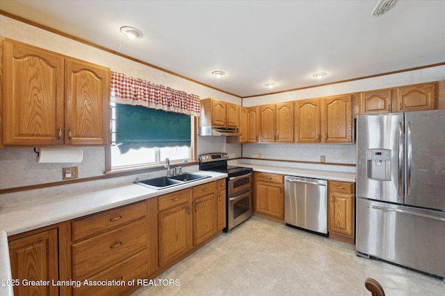 kitchen featuring sink, decorative backsplash, ornamental molding, and stainless steel appliances