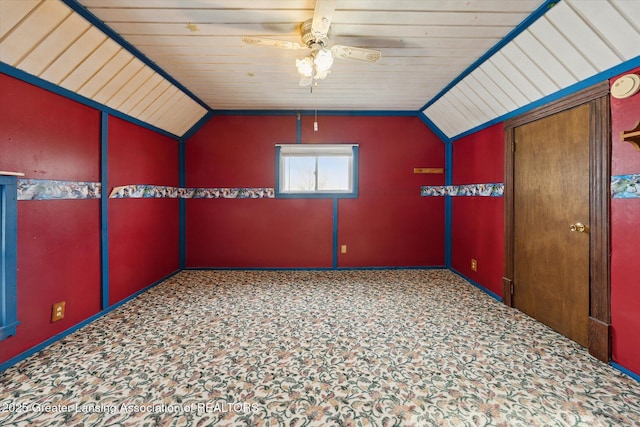 bonus room featuring vaulted ceiling, wood ceiling, and ceiling fan