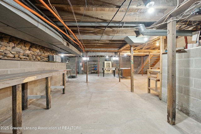 basement featuring water heater