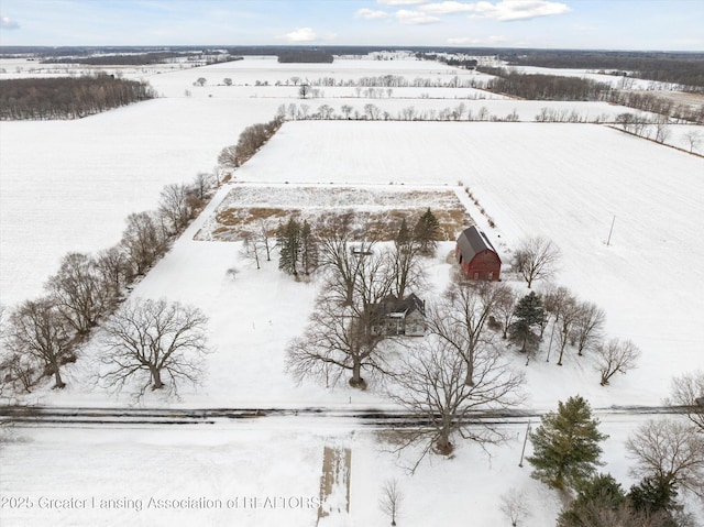 snowy aerial view with a rural view