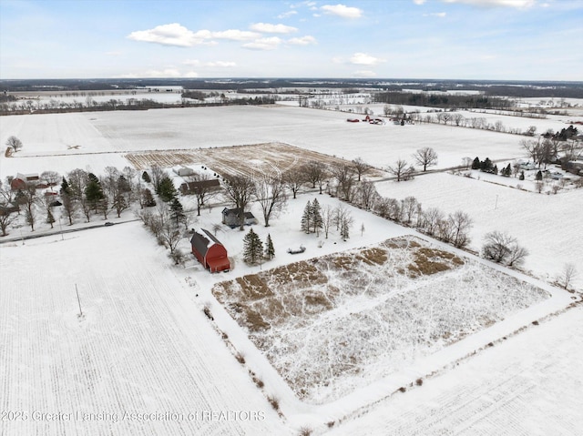 snowy aerial view with a rural view