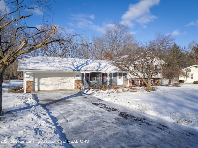 single story home with a garage