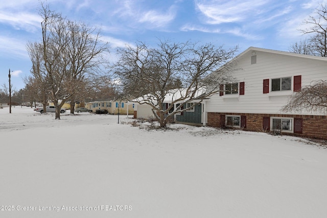 view of snow covered property