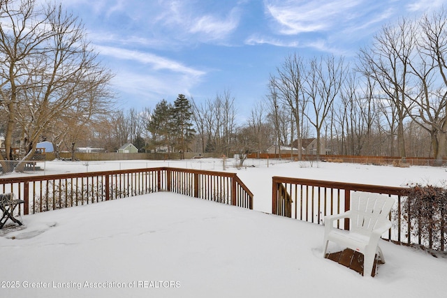 view of snow covered deck