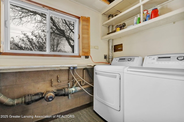 washroom with independent washer and dryer