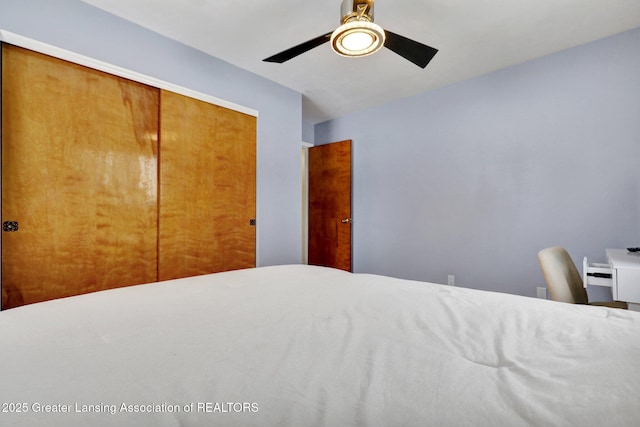 unfurnished bedroom with a closet and ceiling fan