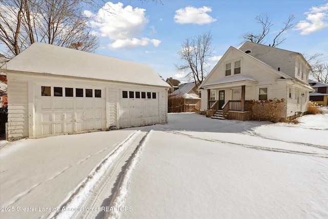 view of snow covered garage