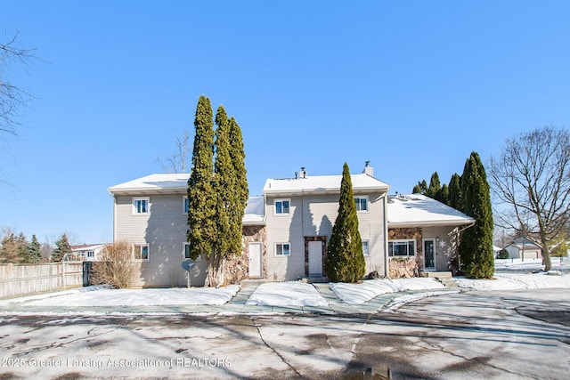 view of snow covered house