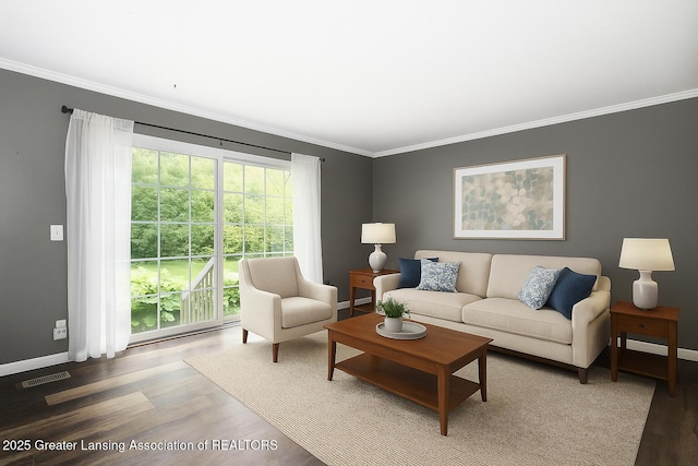 1008 Touraine Ave, East Lansing, MI 48823 - living area featuring ornamental molding, wood finished floors, and baseboards