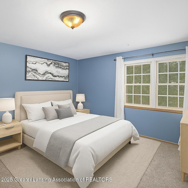 1008 Touraine Ave, East Lansing, MI 48823 - carpeted bedroom with baseboards