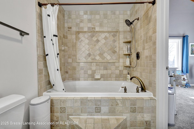 bathroom with shower / tub combo with curtain and toilet