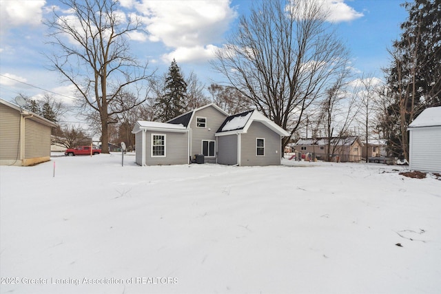 view of snow covered property