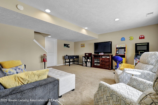 living room with carpet floors and a textured ceiling