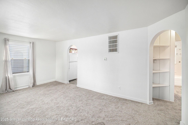 view of carpeted empty room