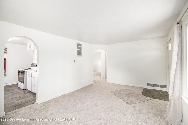 spare room featuring carpet flooring