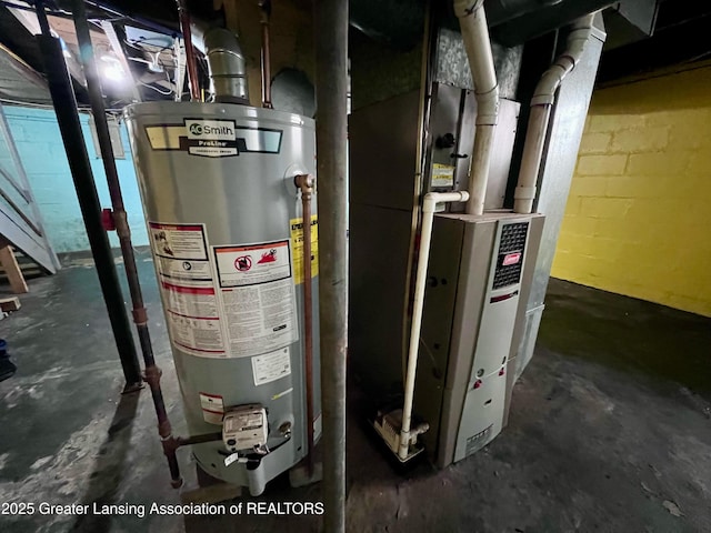 utility room featuring gas water heater