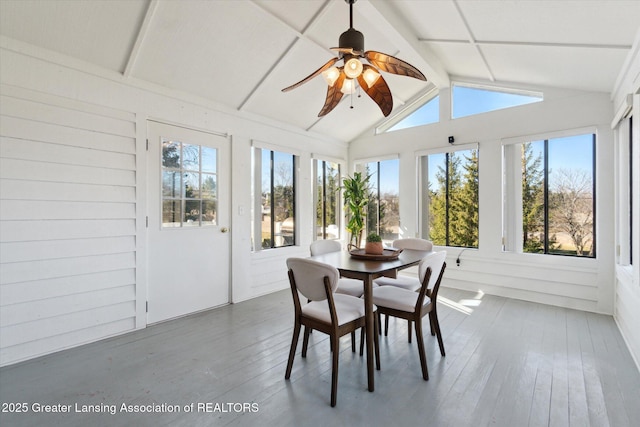 sunroom featuring vaulted ceiling with beams and ceiling fan