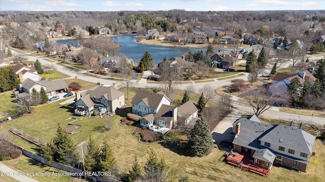 birds eye view of property featuring a residential view and a water view