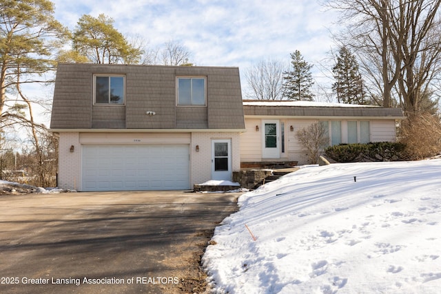 view of front of property with a garage