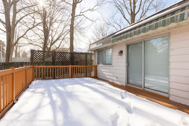 view of snow covered deck