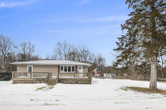 view of front of house with a deck