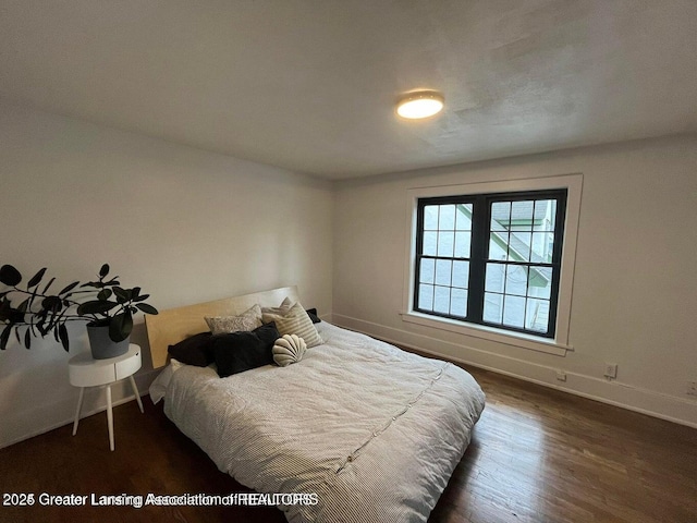 bedroom featuring dark hardwood / wood-style floors