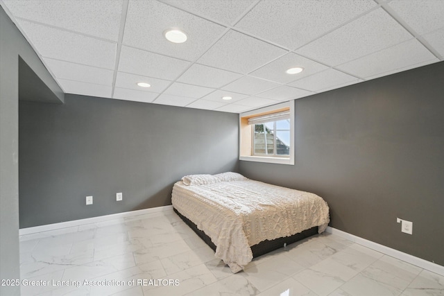 bedroom with a drop ceiling