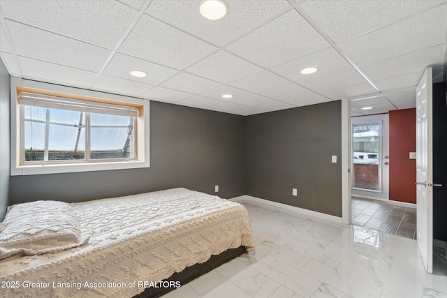 bedroom featuring a drop ceiling