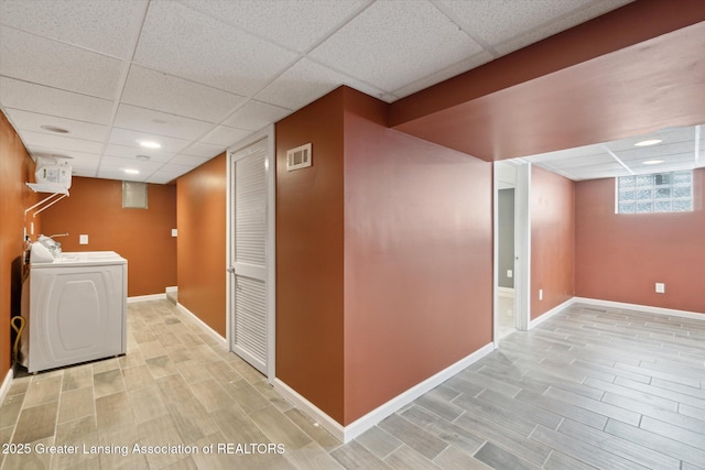 washroom featuring separate washer and dryer and light wood-type flooring