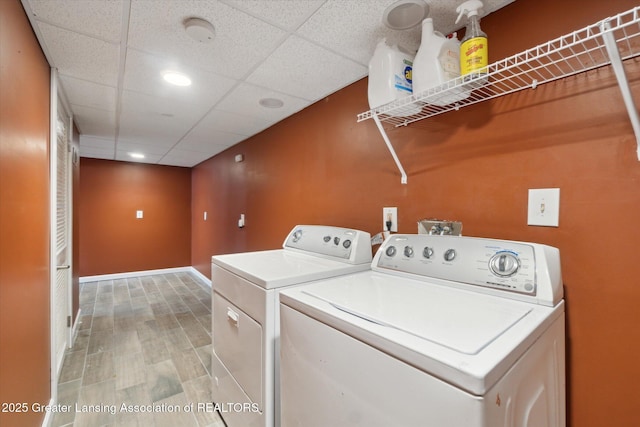 washroom with separate washer and dryer