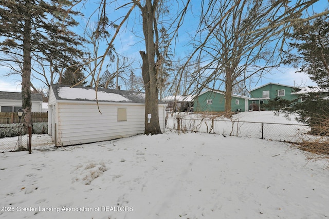 view of yard covered in snow