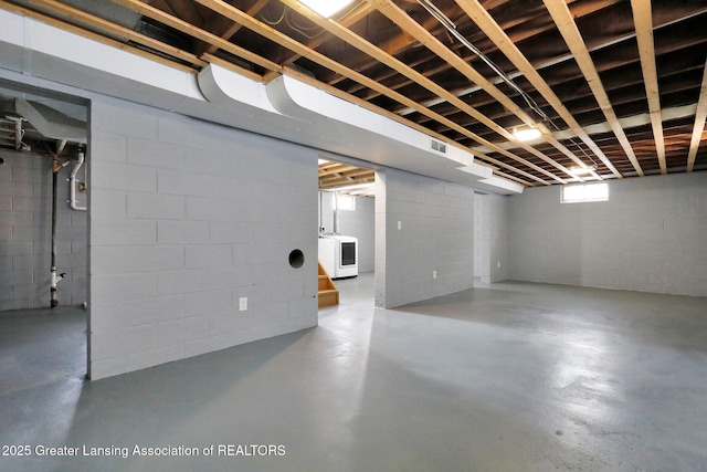 basement with washer / dryer