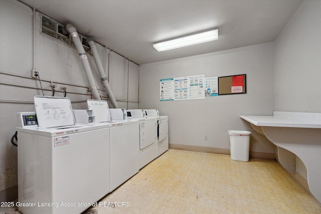 laundry area with washer and dryer