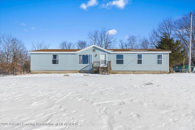 view of snow covered property