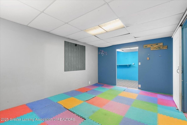 bedroom featuring a drop ceiling