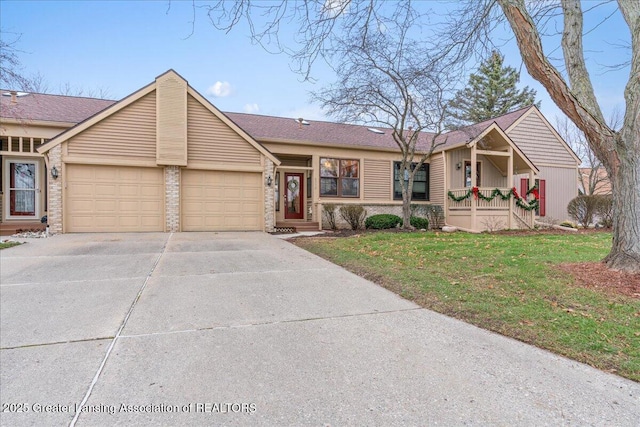 ranch-style home featuring a garage, a porch, and a front lawn