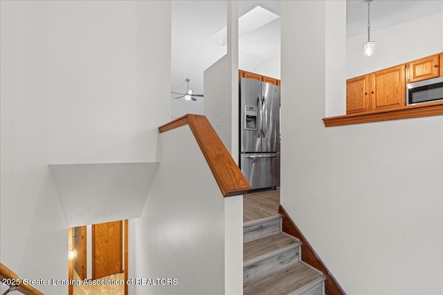 staircase featuring hardwood / wood-style floors