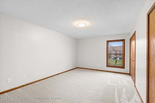 interior space featuring a textured ceiling