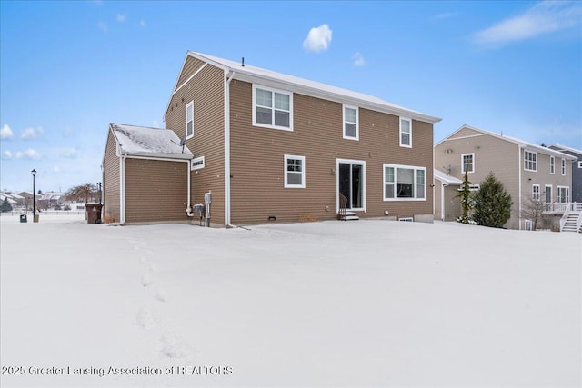 view of snow covered property