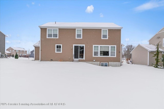 view of snow covered house