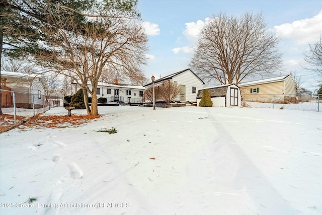 view of front facade featuring a storage shed