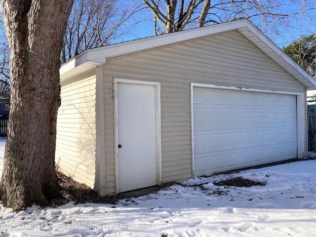 view of snow covered garage