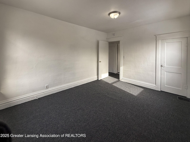 view of carpeted spare room