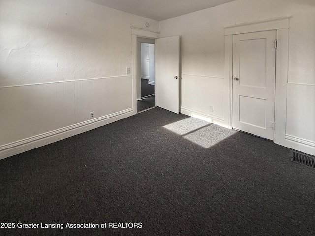 unfurnished bedroom featuring carpet flooring