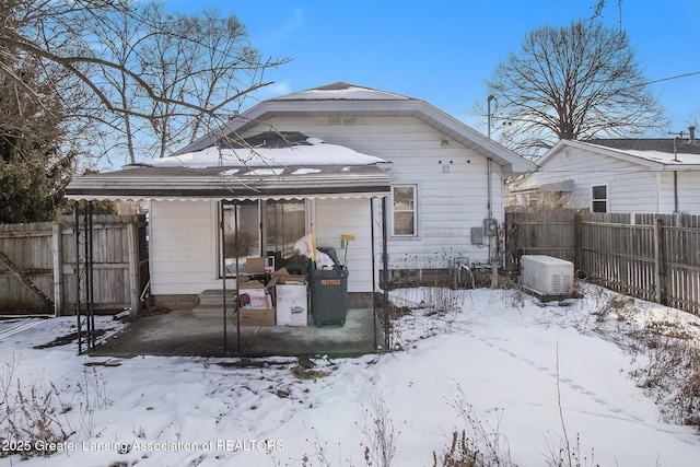 view of snow covered house