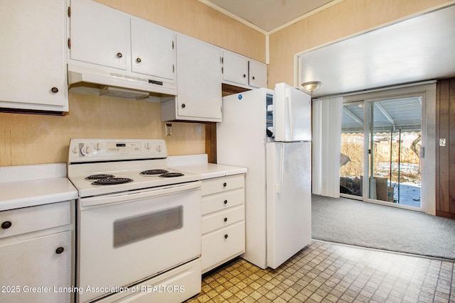 kitchen featuring white cabinetry, white appliances, light carpet, and crown molding